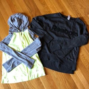 1 under armour sweatshirt and 1 reebok sweatshirt